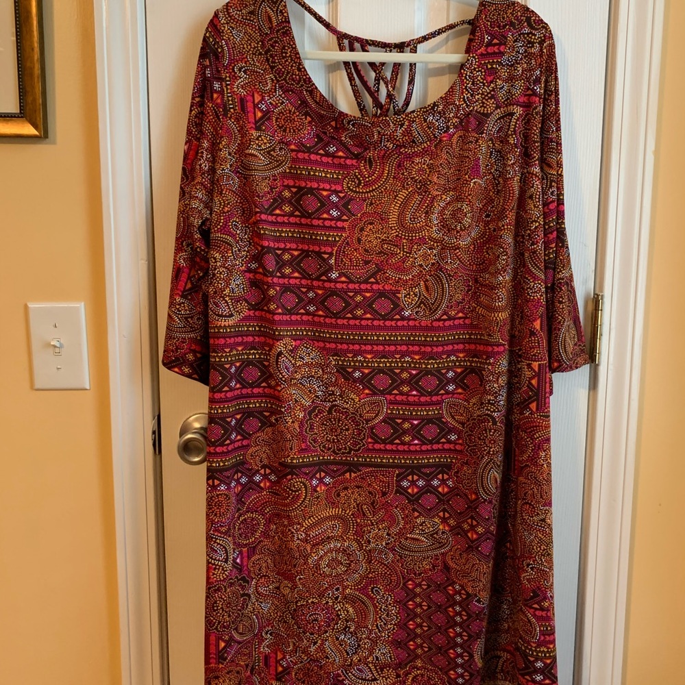 Multi-colored dress with criss-cross back detail.